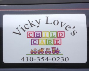 A sticker for vicky love's child care.