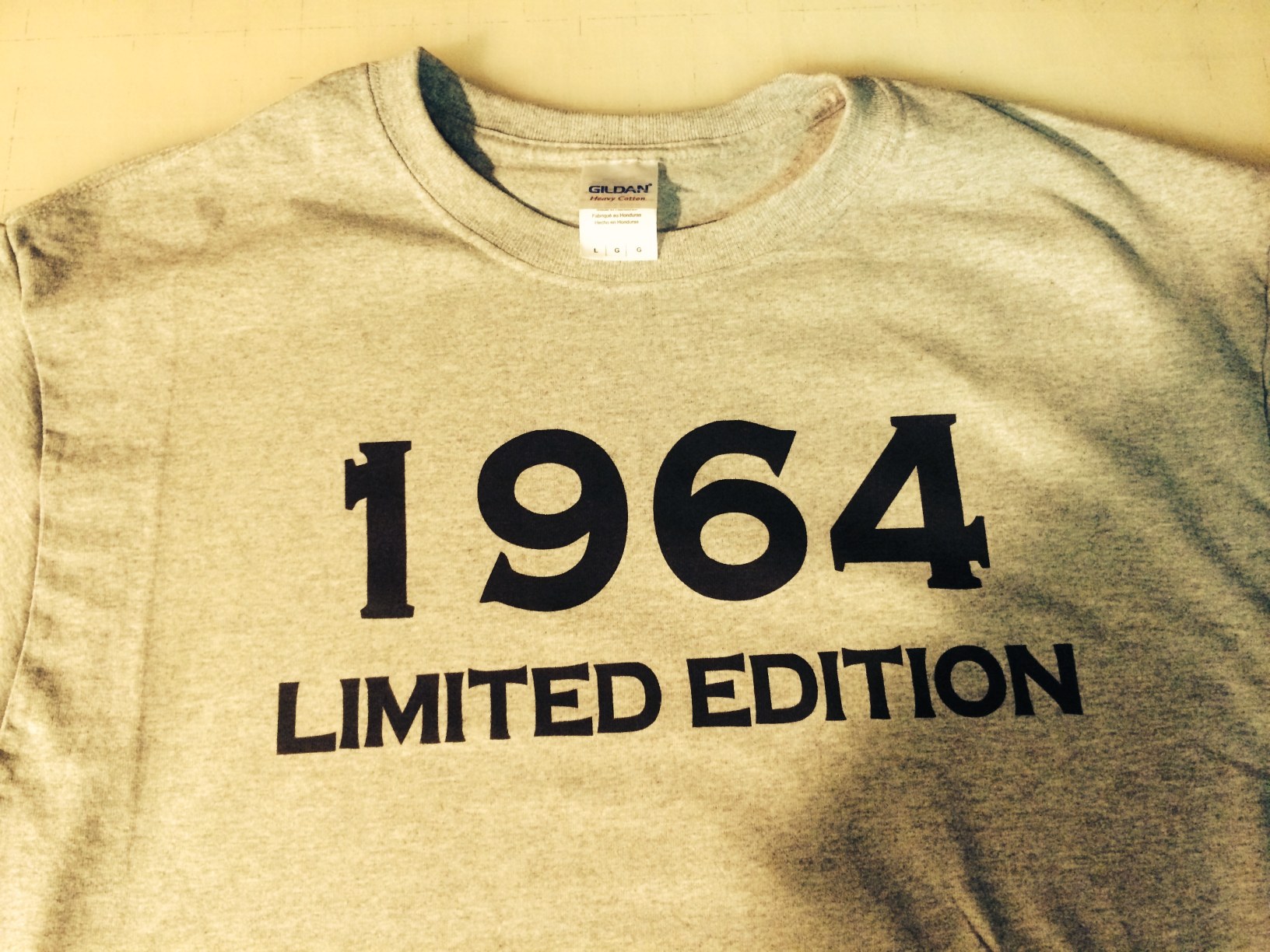 A gray t-shirt with the year 
