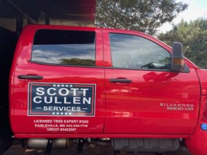Red chevrolet silverado 2500 hd truck with a 