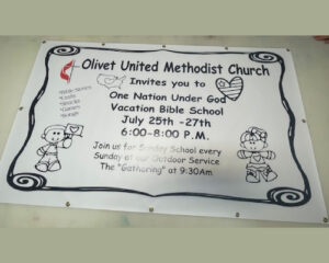 Banner for olivet united methodist church announcing 